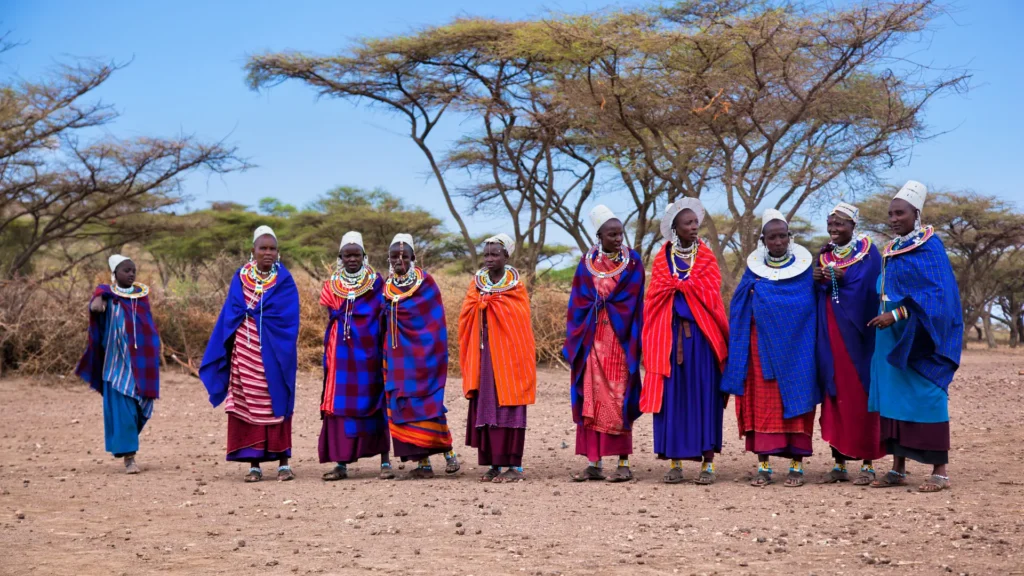 Maasai guide interacting with guests