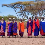 Maasai guide interacting with guests